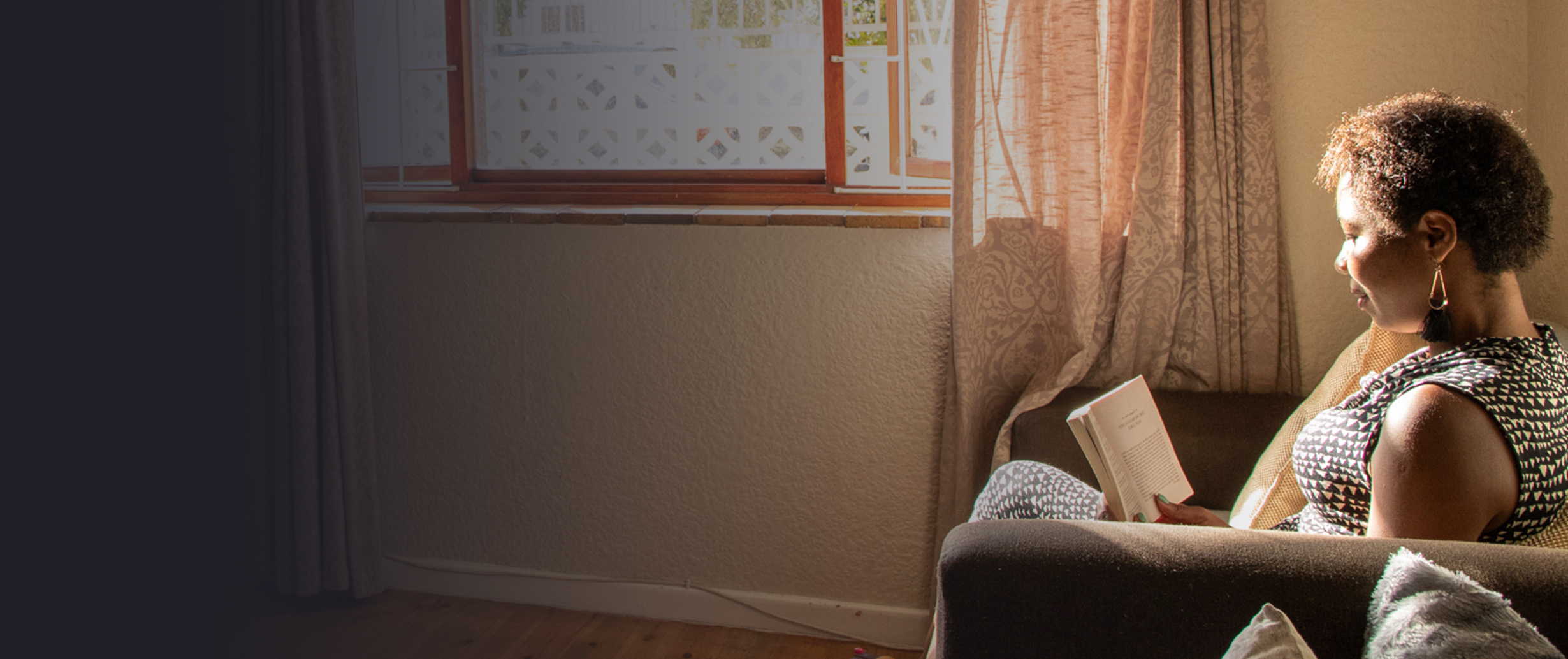 woman sitting reading a book